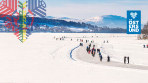 medvinden med människor. fjäll i bakgrunden